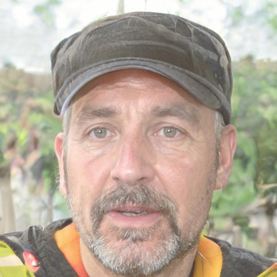 Instructor Kieran Donnelly reviewing financial reports